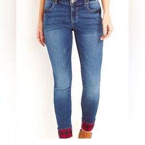 Maurice’s Jeans with red and black plaid cuffs  size medium.